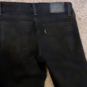 Levi's 711 black distressed skinny jeans